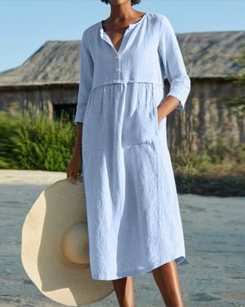 Chic summer midi dress with airy cotton fabric and elegant button closure
