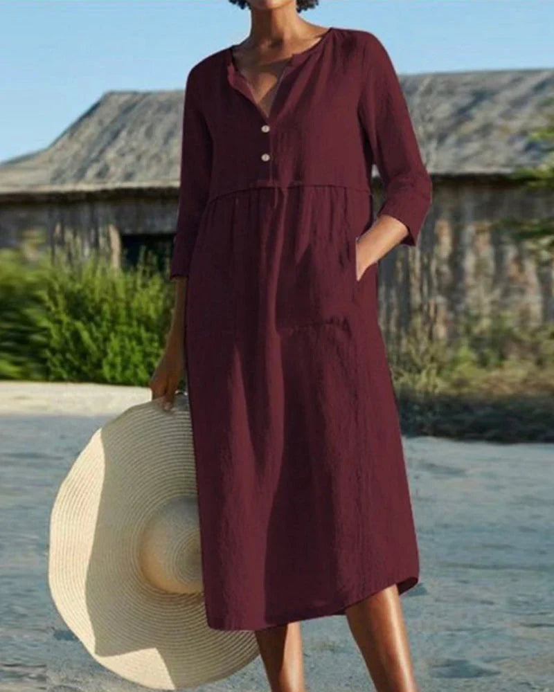 Chic summer midi dress with airy cotton fabric and elegant button closure
