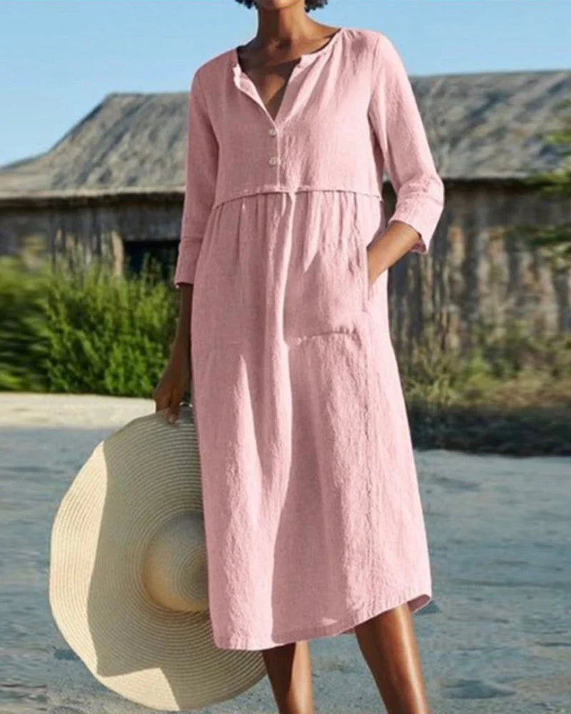 Chic summer midi dress with airy cotton fabric and elegant button closure