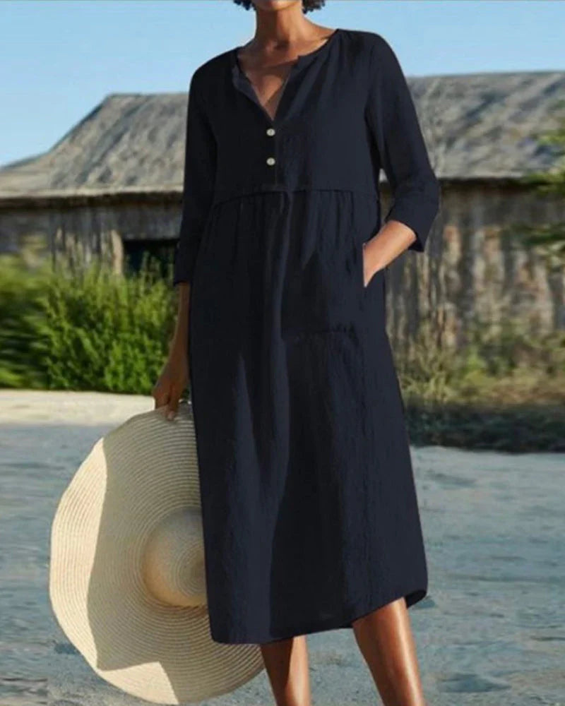 Chic summer midi dress with airy cotton fabric and elegant button closure
