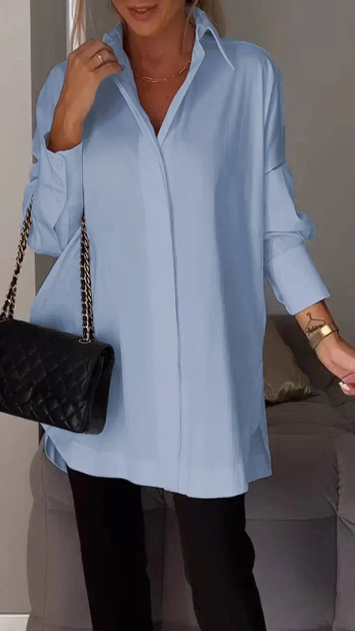 Elegant oversize shirt blouse with rolled sleeves