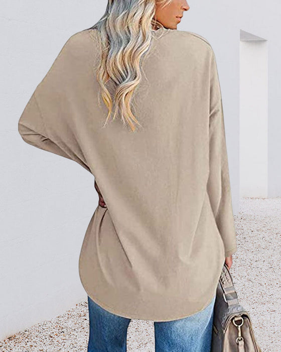 Plain women's blouse with long sleeves and v-neck