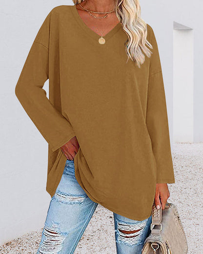 Plain women's blouse with long sleeves and v-neck