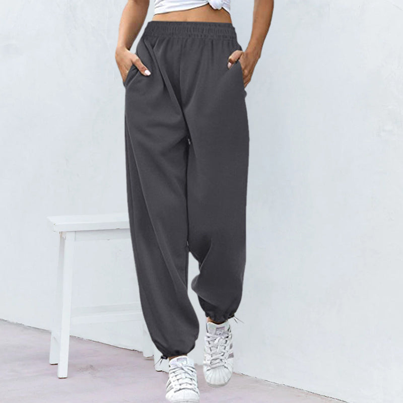 Casual women's sports pants with wide legs and drawstring