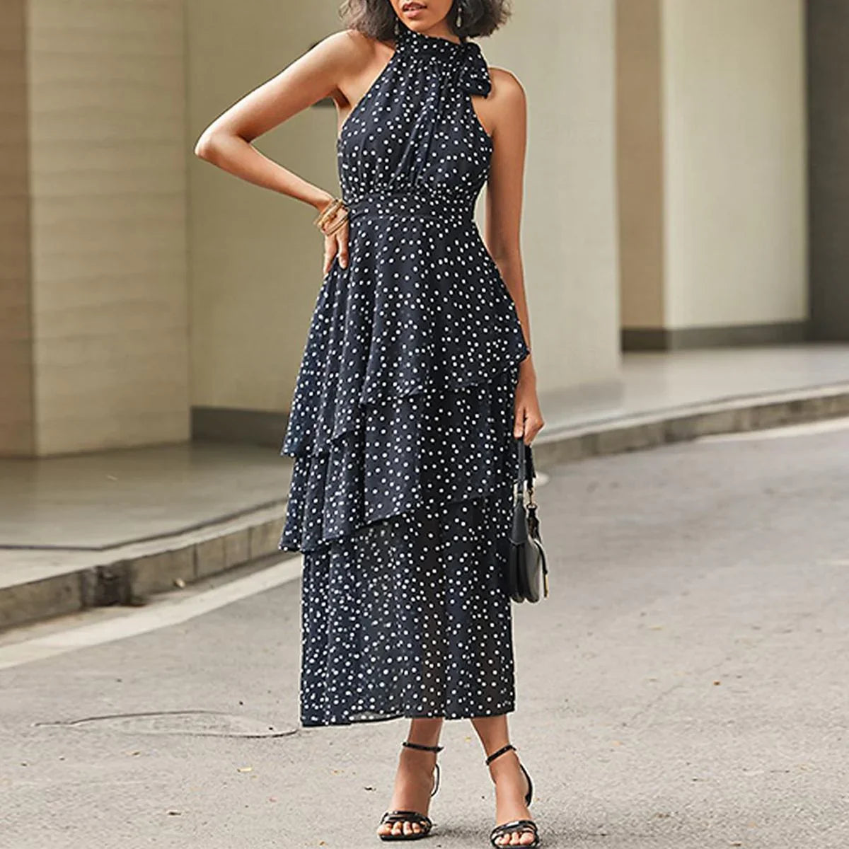 Emma - modern halterneck maxi dress with a polka dot pattern