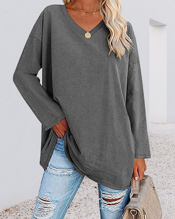 Plain women's blouse with long sleeves and v-neck