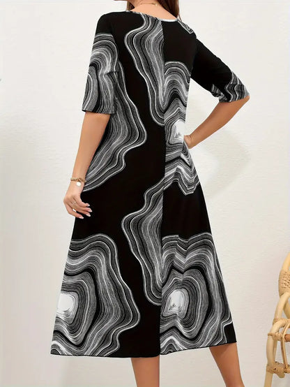 Nora loose maxi dress with graphic print and crew neck