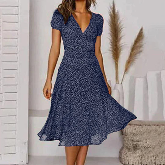 Sweeping a-line dress with a v-neck and swinging hem