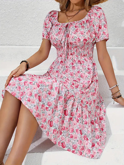 Emma - ruched dress with knot front and floral print