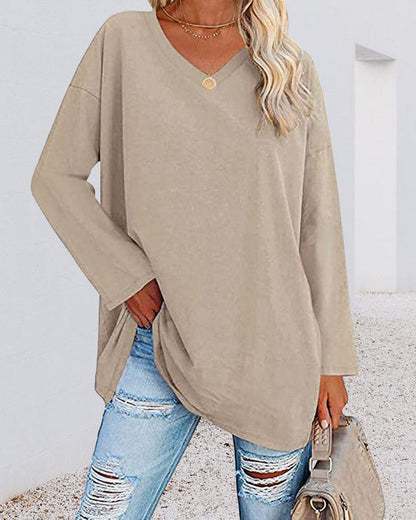 Plain women's blouse with long sleeves and v-neck