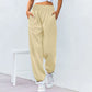 Casual women's sports pants with wide legs and drawstring