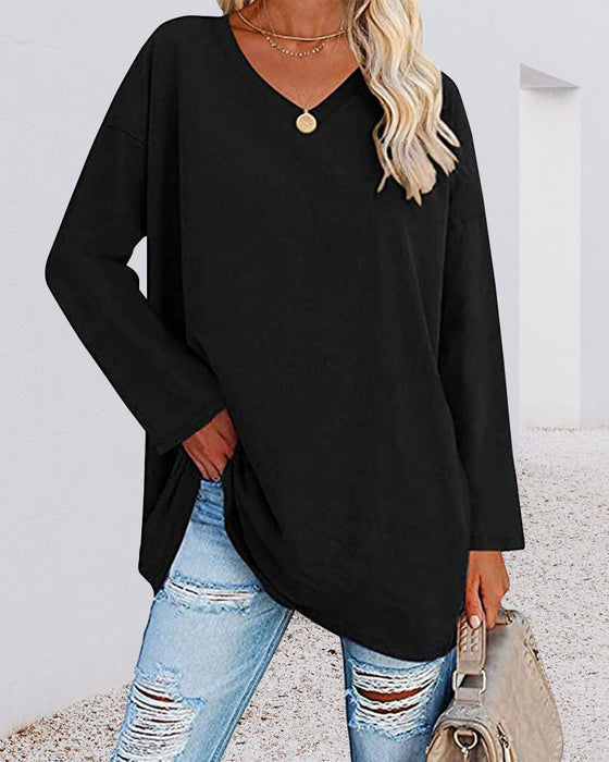 Plain women's blouse with long sleeves and v-neck