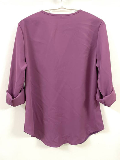 Hazel – casual, ruffled blouse with roll-up sleeves and half zip