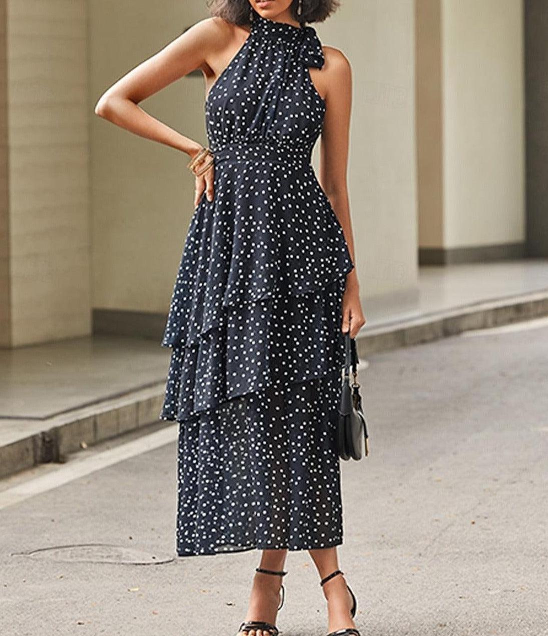 Emma - modern halterneck maxi dress with a polka dot pattern