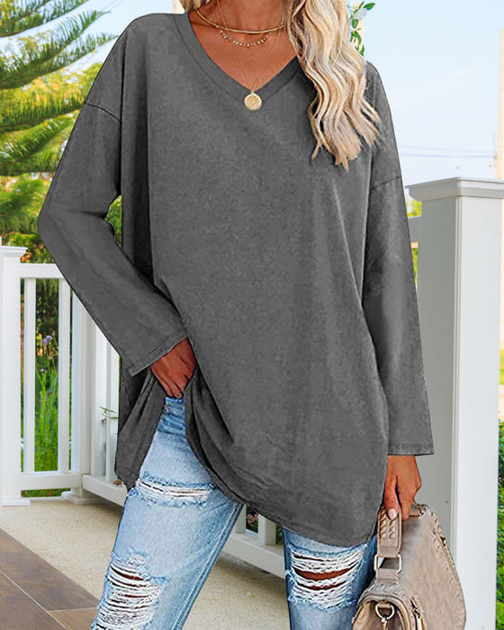 Plain women's blouse with long sleeves and v-neck