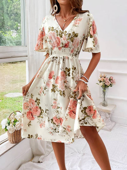 Ella - elegant a-line dress with floral print, v-neck and ruffle sleeves