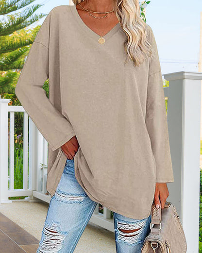 Plain women's blouse with long sleeves and v-neck