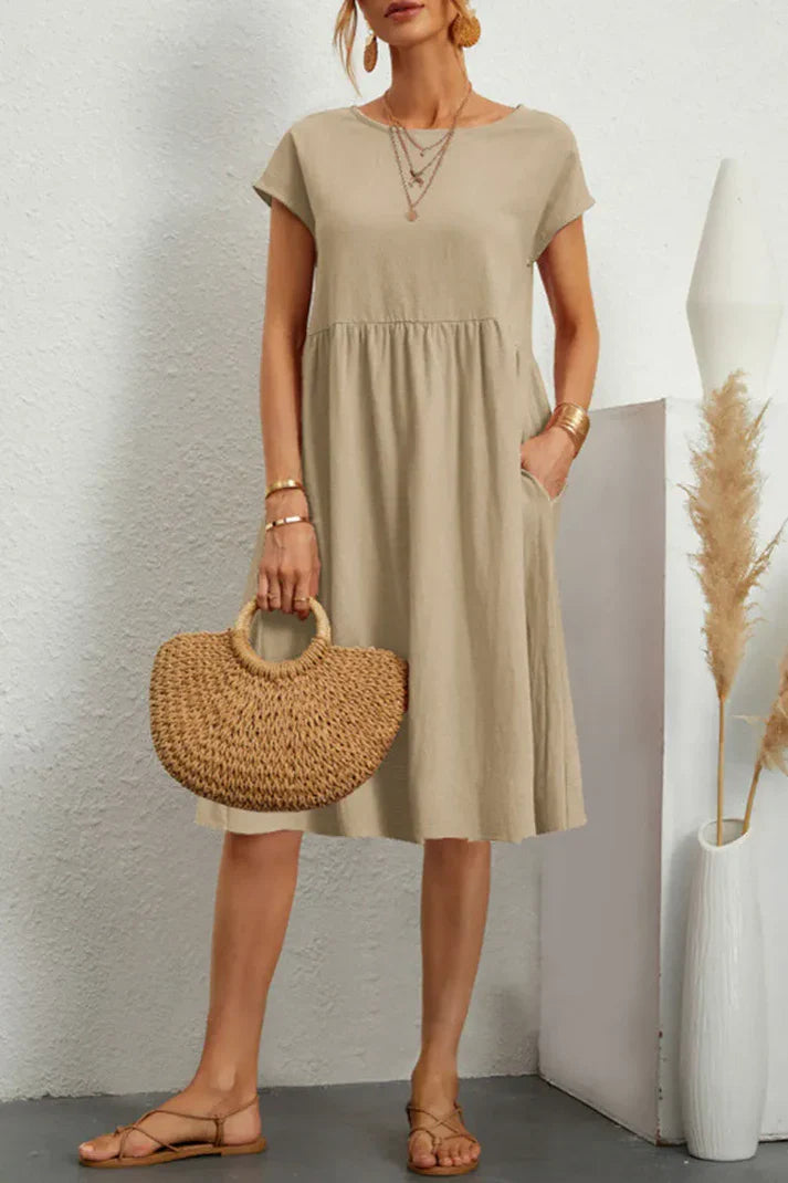 Melanie - plain-colored, casual dress with short sleeves and a round neckline