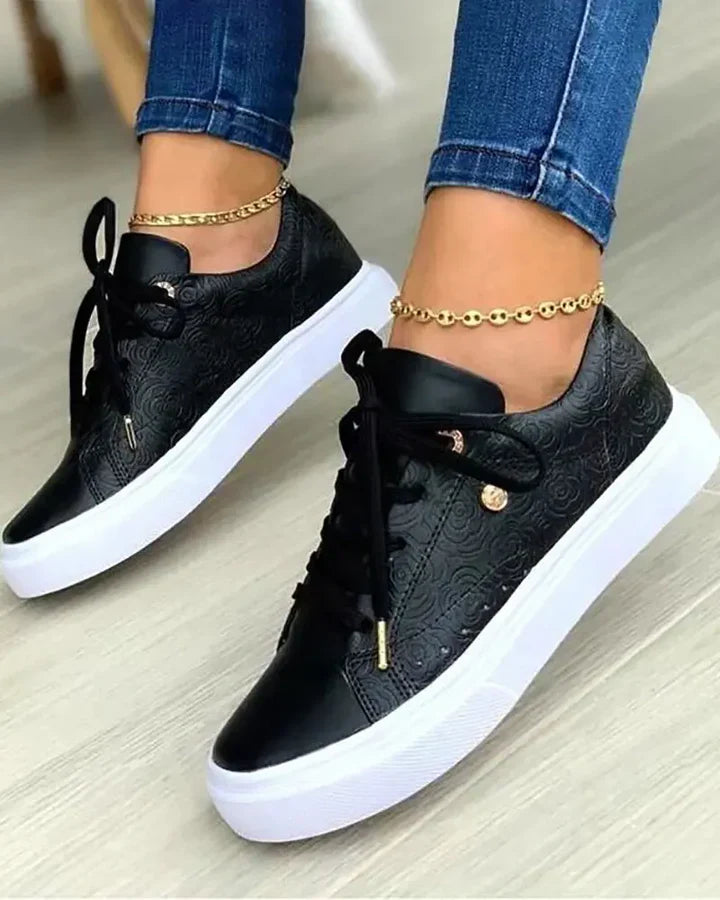 Chic sneakers with gold detail