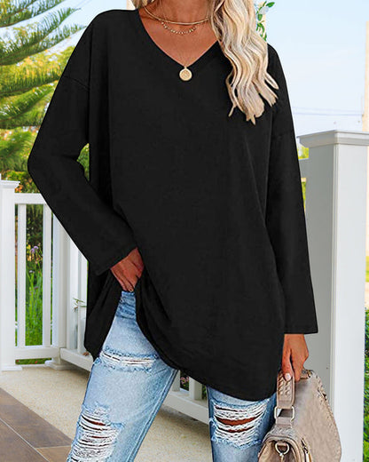 Plain women's blouse with long sleeves and v-neck