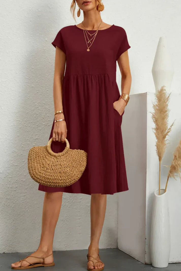 Melanie - plain-colored, casual dress with short sleeves and a round neckline