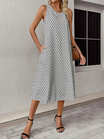 Olivia – midi dress with a round neckline and an all-over print