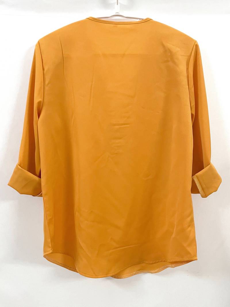 Hazel – casual, ruffled blouse with roll-up sleeves and half zip