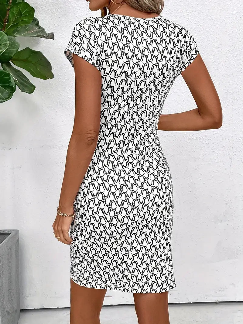 Riley – elegant dress with a round neckline and an all-over print