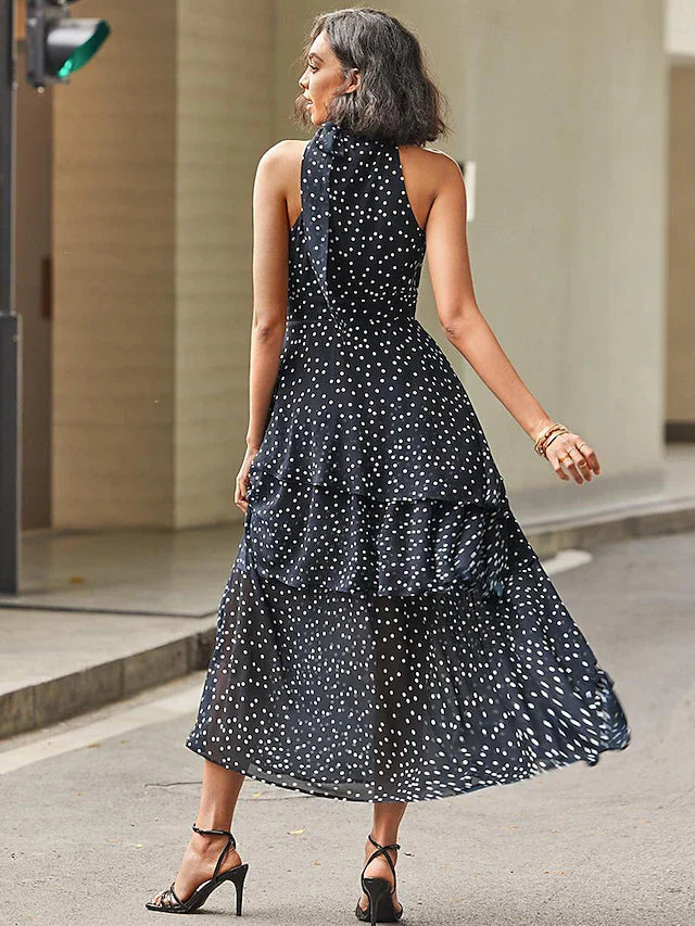 Emma - modern halterneck maxi dress with a polka dot pattern