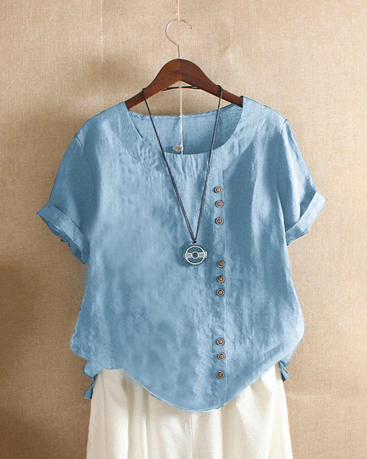 Kelly – plain-colored short-sleeved blouse with a round neckline