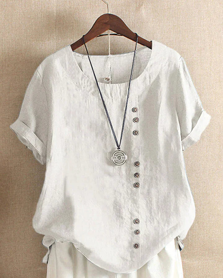 Kelly – plain-colored short-sleeved blouse with a round neckline