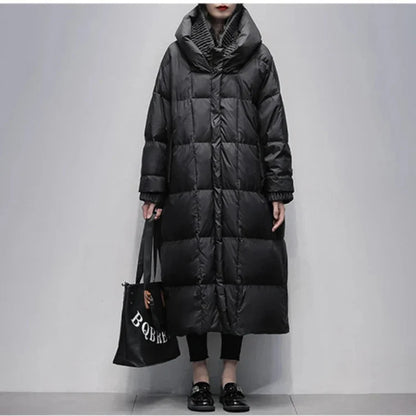 Celie | long puffer jacket with down cape